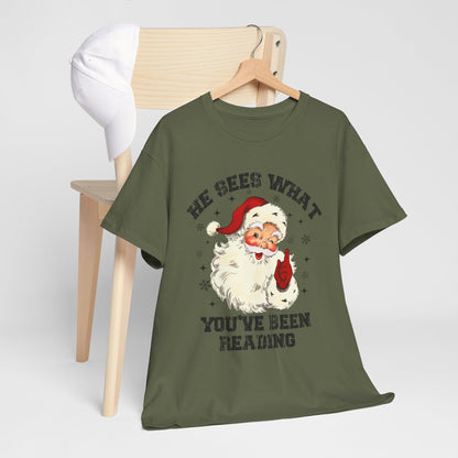 Santa Graphic T-Shirt — “He Sees What You’ve Been Reading” Christmas Tee - Holiday Spicy Reading Tee