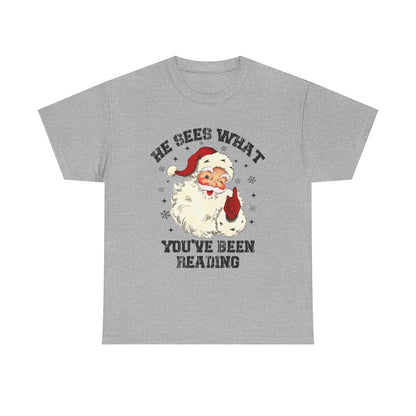 Santa Graphic T-Shirt — “He Sees What You’ve Been Reading” Christmas Tee - Holiday Spicy Reading Tee